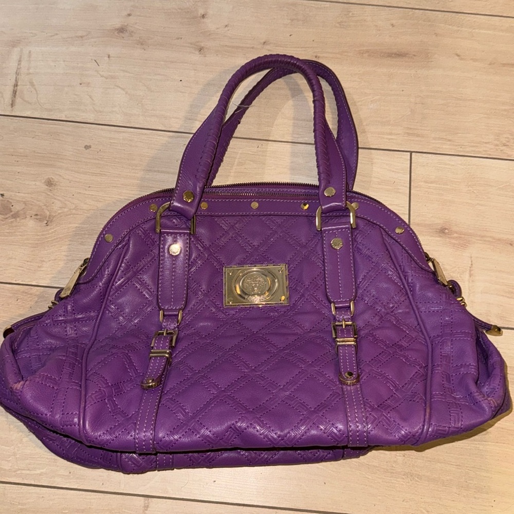 Purple Versace tote in like new condition with original authentication card